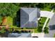 Aerial view of the house's roof and backyard with an in-ground fire pit at 188 Donning Dr, Summerville, SC 29483