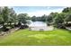 Outdoor community stage overlooking a serene pond and green lawn at 188 Donning Dr, Summerville, SC 29483