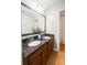 Bathroom showcasing a double sink vanity with granite countertops and wooden cabinetry at 188 Donning Dr, Summerville, SC 29483
