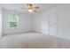 Spacious, neutral bedroom with carpet, a ceiling fan and large window for natural light at 188 Donning Dr, Summerville, SC 29483