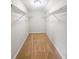 Spacious walk-in closet with shelving and neutral carpeting, providing ample storage at 188 Donning Dr, Summerville, SC 29483
