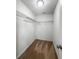 Walk-in closet with metal shelving and neutral carpeting, providing ample storage space at 188 Donning Dr, Summerville, SC 29483