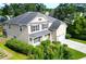 Two-story home with well-kept landscaping, a two-car garage, and a welcoming front porch at 188 Donning Dr, Summerville, SC 29483