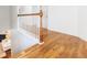 Hallway features hardwood floor, staircase, and neutral paint at 188 Donning Dr, Summerville, SC 29483