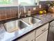 The kitchen features a stainless steel sink and granite countertops at 188 Donning Dr, Summerville, SC 29483