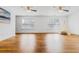 Spacious living room with hardwood floors, natural light, and ceiling fans at 188 Donning Dr, Summerville, SC 29483