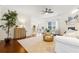Bright living room with large windows, fireplace, and stylish furniture at 188 Donning Dr, Summerville, SC 29483