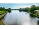 Picturesque view of a long waterway with greenery and reflections at 188 Donning Dr, Summerville, SC 29483