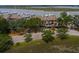 Aerial view of condos with water access, assigned parking, and green spaces for relaxation at 1919 Marsh Oak Ln, Seabrook Island, SC 29455