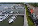 Beautiful aerial view of townhome next to marina with yachts, with easy access to waterfront living at 1919 Marsh Oak Ln, Seabrook Island, SC 29455