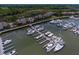 Lush aerial view of a waterfront townhome community with private docks and a full service marina at 1919 Marsh Oak Ln, Seabrook Island, SC 29455