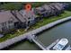 Aerial view of charming waterfront townhomes, each with private decks and access to the dock at 1919 Marsh Oak Ln, Seabrook Island, SC 29455