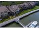 Aerial view of charming waterfront townhomes, each with private decks and access to the dock at 1919 Marsh Oak Ln, Seabrook Island, SC 29455
