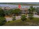 Aerial view of condos with water access, assigned parking, and green spaces for relaxation at 1919 Marsh Oak Ln, Seabrook Island, SC 29455