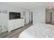 This bedroom boasts a large bed, matching dresser, and a flat-screen TV at 1919 Marsh Oak Ln, Seabrook Island, SC 29455