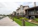 View down the condo's dock with water access for each unit and a green common area at 1919 Marsh Oak Ln, Seabrook Island, SC 29455