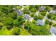 An elevated view of a house with green foliage, and other neighborhood homes at 2026 Thornhill Dr, Summerville, SC 29485