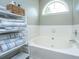 Bathroom featuring garden tub and window at 2026 Thornhill Dr, Summerville, SC 29485
