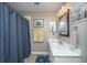 Small bathroom with shower and vanity, decorated with artwork at 2026 Thornhill Dr, Summerville, SC 29485
