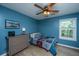 Bedroom featuring a comfortable bed, neutral dresser and abundant natural light from the window at 2026 Thornhill Dr, Summerville, SC 29485