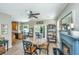 Cozy dining area with a round table, fireplace, and sliding doors to the patio at 2026 Thornhill Dr, Summerville, SC 29485