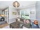Comfortable living room with neutral walls, a sofa, and a large window for natural light at 2026 Thornhill Dr, Summerville, SC 29485