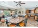 Open living area featuring wood floors, dining table, and view to a living room and entry way at 2026 Thornhill Dr, Summerville, SC 29485