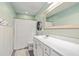Well-lit bathroom featuring modern fixtures, white vanity, and a shower with curtain at 207 Center Hill Ct, Summerville, SC 29485