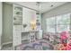 A charming bedroom featuring built-in shelving and storage solutions, offering both style and functionality at 207 Center Hill Ct, Summerville, SC 29485