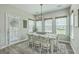 Charming dining area featuring a rustic table with seating for six and a stylish chandelier at 207 Center Hill Ct, Summerville, SC 29485
