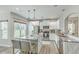 Bright kitchen with granite countertops, modern appliances, and center island with seating at 207 Center Hill Ct, Summerville, SC 29485