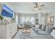 Comfortable living room featuring ample seating, a ceiling fan and stylish decor at 207 Center Hill Ct, Summerville, SC 29485
