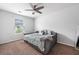 Bright bedroom featuring a comfortable bed, neutral walls, a ceiling fan, and plenty of natural light at 209 Hayworth Rd, Summerville, SC 29486