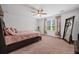 Cozy bedroom featuring soft lighting, a ceiling fan, and a large window for natural illumination at 209 Hayworth Rd, Summerville, SC 29486