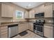 A kitchen featuring stainless steel appliances, ample cabinet space, and granite countertops for a modern touch at 209 Hayworth Rd, Summerville, SC 29486