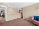 Upstairs loft area with neutral tones, and plush seating offers a versatile space for relaxation and entertainment at 209 Hayworth Rd, Summerville, SC 29486