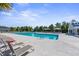 Resort-style pool with ample seating, large swimming area, and a covered seating area for entertaining and relaxing at 209 Hayworth Rd, Summerville, SC 29486