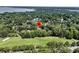 Overhead view shows the property surrounded by lush greenery and neighboring the golf course at 2142 Golfview Dr, Charleston, SC 29412