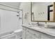 Clean bathroom with a tiled shower, marble countertop, and modern fixtures at 2142 Golfview Dr, Charleston, SC 29412