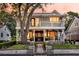 Charming two-story home featuring a double-door entry and a well-manicured front yard at 2142 Golfview Dr, Charleston, SC 29412