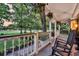 Relaxing front porch with rocking chairs and view of the neighborhood at 2142 Golfview Dr, Charleston, SC 29412