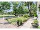 Well-manicured front yard with brick walkway and lush green lawn at 2142 Golfview Dr, Charleston, SC 29412