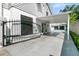 Home features a covered carport leading to a detached two car garage at 2142 Golfview Dr, Charleston, SC 29412