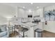 Contemporary kitchen featuring white cabinetry, stainless steel appliances, and marble countertops at 2142 Golfview Dr, Charleston, SC 29412
