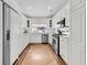 Bright, all-white kitchen featuring modern appliances, sleek countertops, and ample cabinet space, perfect for culinary enthusiasts at 2142 Golfview Dr, Charleston, SC 29412