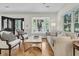 Charming living room with a bay window seat, comfortable seating, and elegant decor, creating a welcoming atmosphere at 2142 Golfview Dr, Charleston, SC 29412