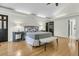 Spacious main bedroom featuring hardwood floors, a tray ceiling, and neutral decor at 2142 Golfview Dr, Charleston, SC 29412