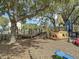 Fun playground featuring a ship structure and climbing area, shaded by mature trees with hanging moss at 2142 Golfview Dr, Charleston, SC 29412