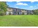Apartment building surrounded by a grassy yard, offering a peaceful residential environment at 2174 Bees Ferry Rd # G, Charleston, SC 29414