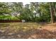 Expansive backyard with mature trees for shade and privacy at 2217 Ramsay St, Charleston, SC 29412